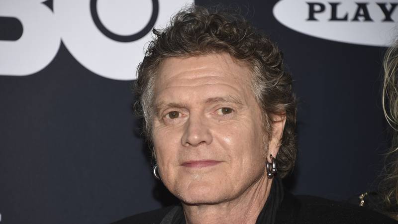 FILE - Rick Allen, of Def Leppard, arrives at the Rock & Roll Hall of Fame induction ceremony...